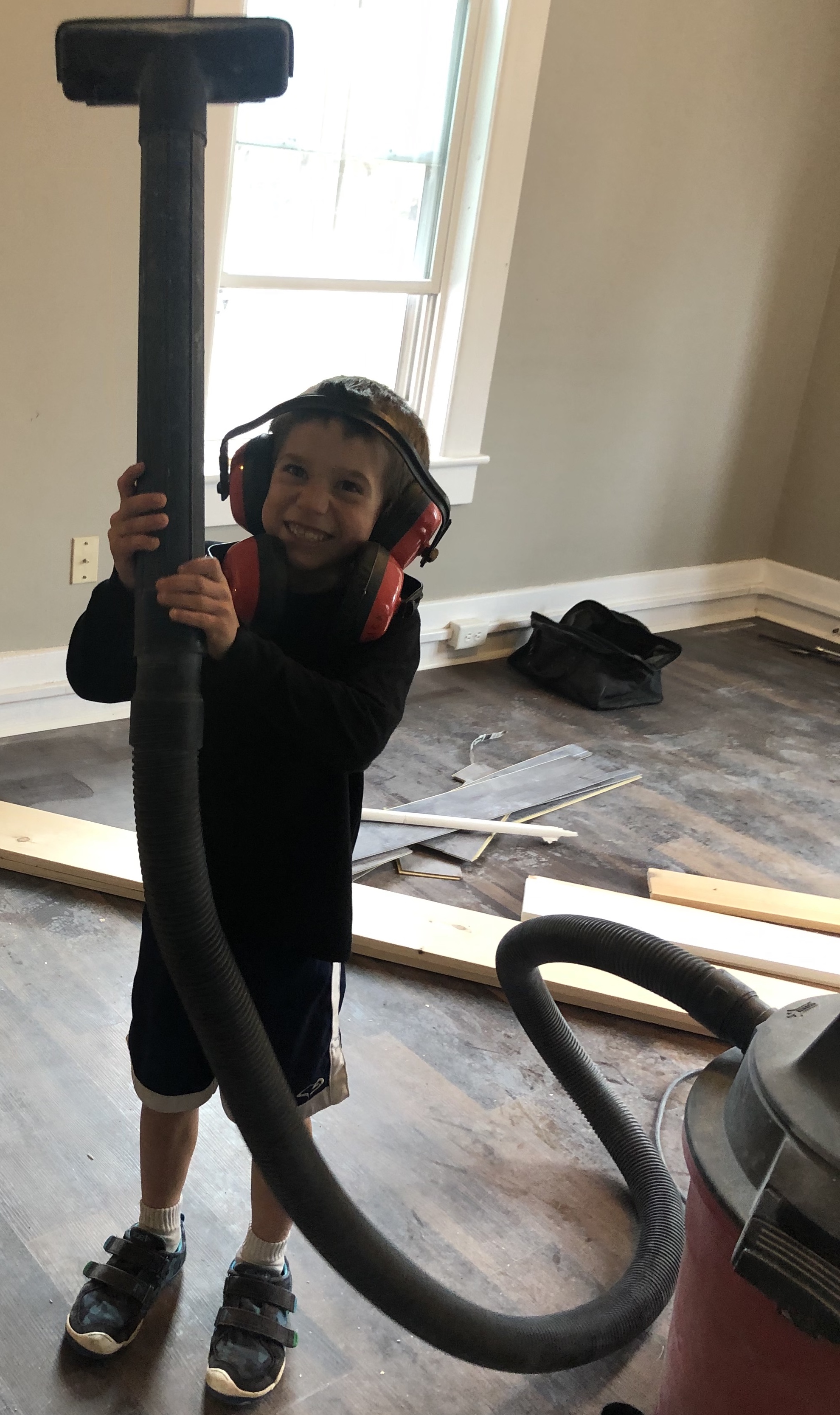 One of the children joins in the renovation of the chapel.